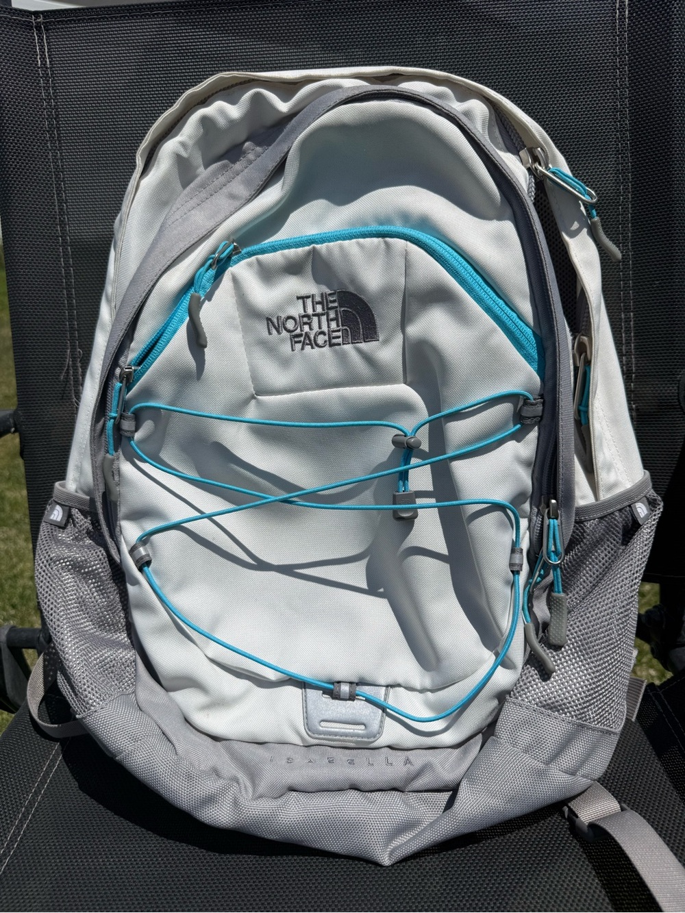 The North Face Women's White and Gray Backpack with Teal Accents